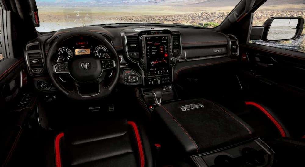 The black and red interior or a 2021 Ram 1500 TRX is shown.