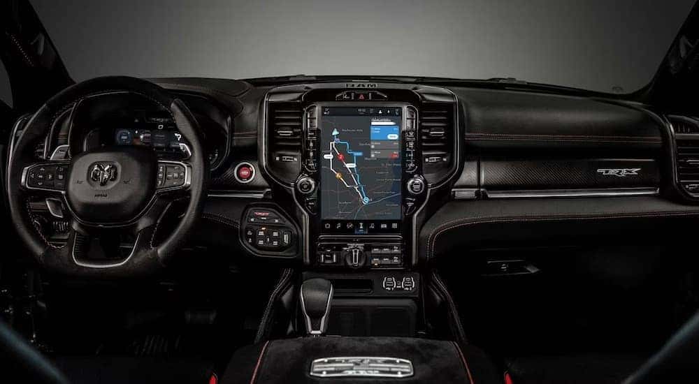 The black interior of a 2023 Ram 1500 TRX is shown from above the center console.