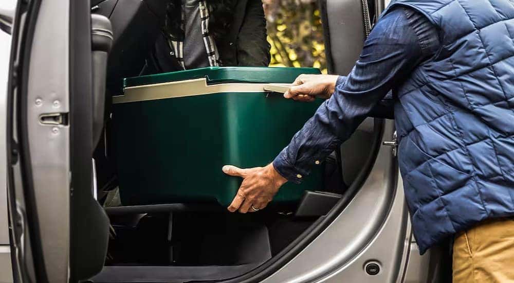 Fold flat storage space is shown in a 2024 Ram 2500 Tradesman.