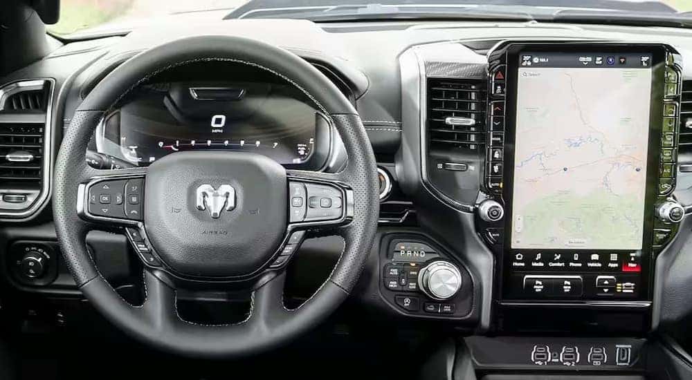 The black dash of a 2025 Ram 1500 is shown.