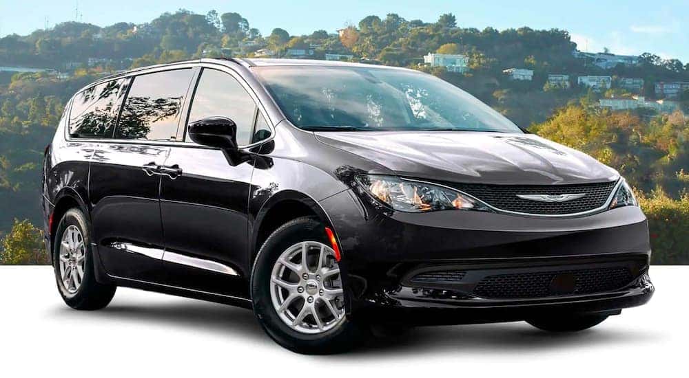 A black 2021 Chrysler Voyager is shown angled right after leaving a Chrysler dealer near you.