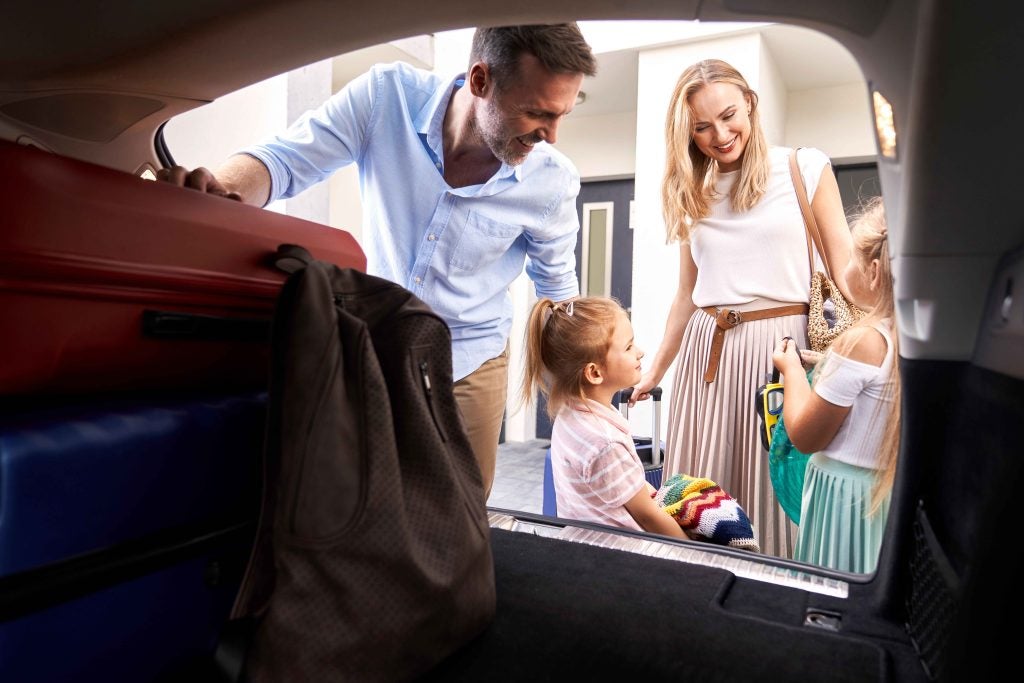 Family getting into a car