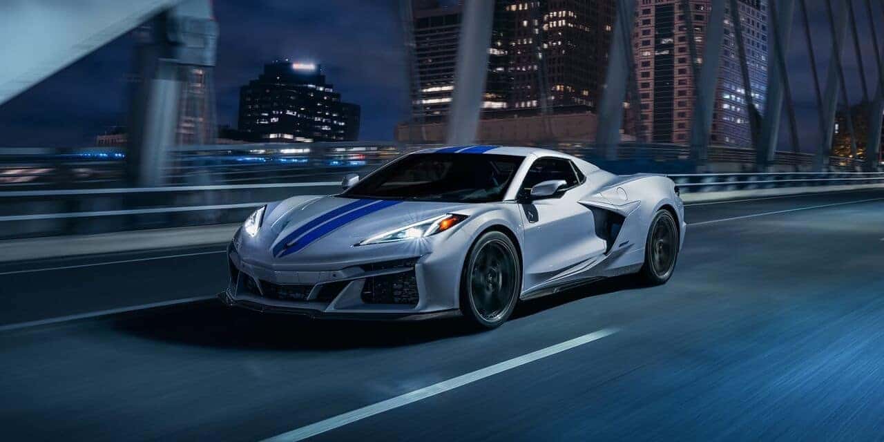 2024 Chevy Corvette Eray driving down street at night