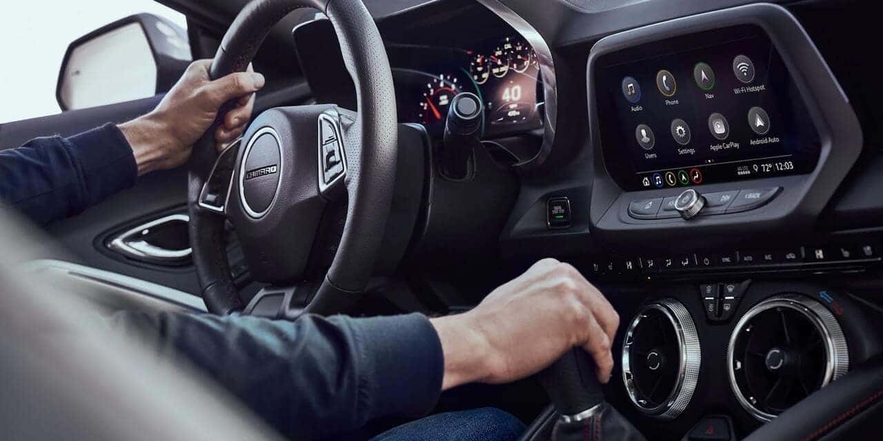 Technology inside of 2023 Chevy Camaro, including infotainment, climate control, driver center