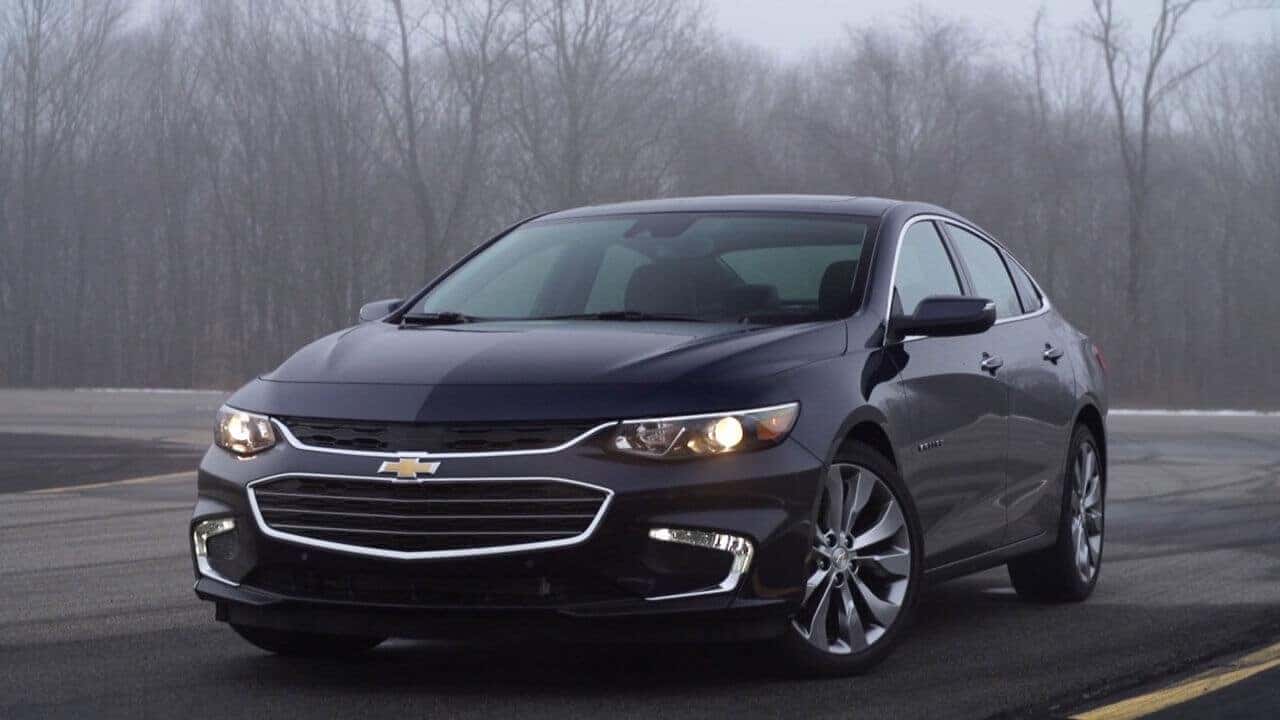2016 Chevy Malibu black driving on road