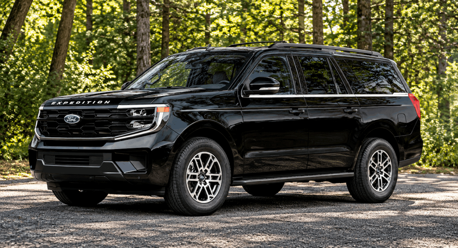 Black 2026 Ford Expedition MAX on a wooded road