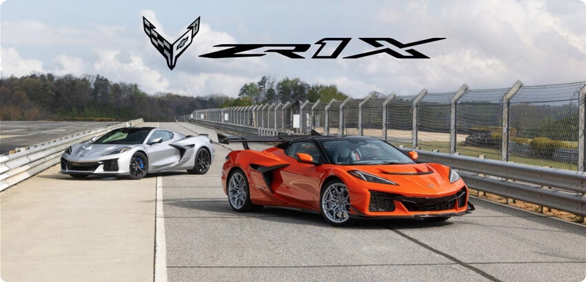Front 3/4 view of Blade Silver Corvette ZR1X and Sebring Orange Tintcoat Corvette ZR1X Convertible with ZTK Performance Package. Preproduction model shown, actual production model may vary.