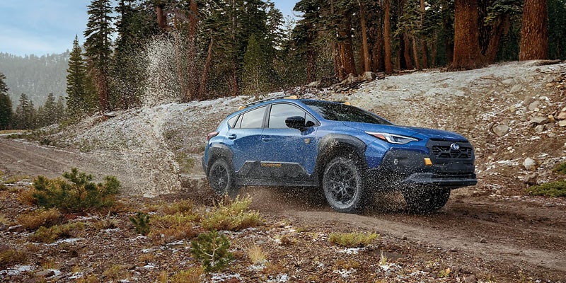 Blue Crosstrek in mountians