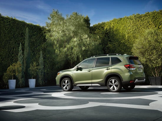 A green Subaru Forester