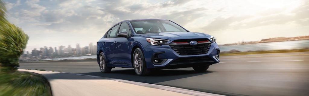 A Subaru Legacy driving