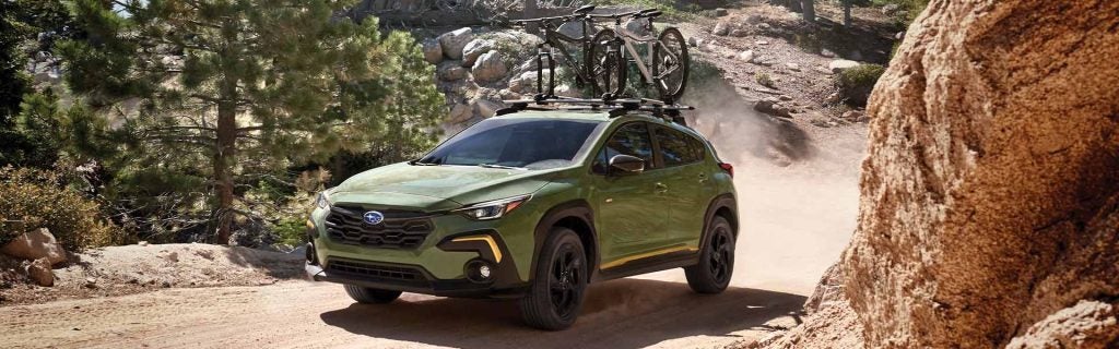 A Subaru in the mountains with bikes