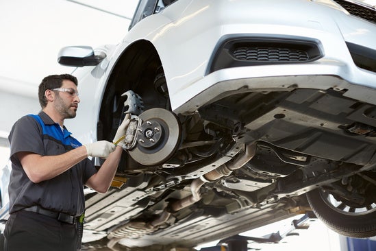 mechanic fixing a tire
