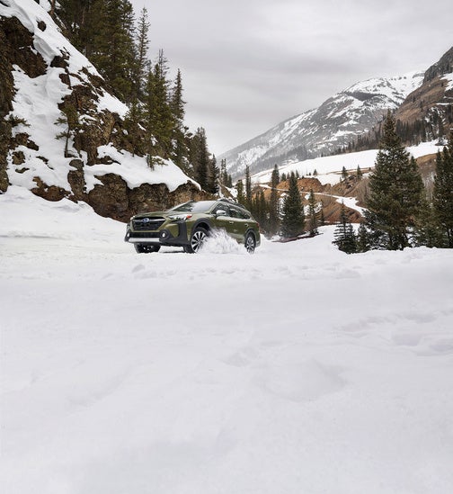 suv driving in the snow