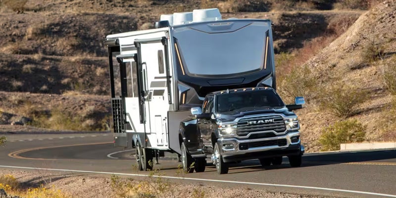 Black RAM Towing on road