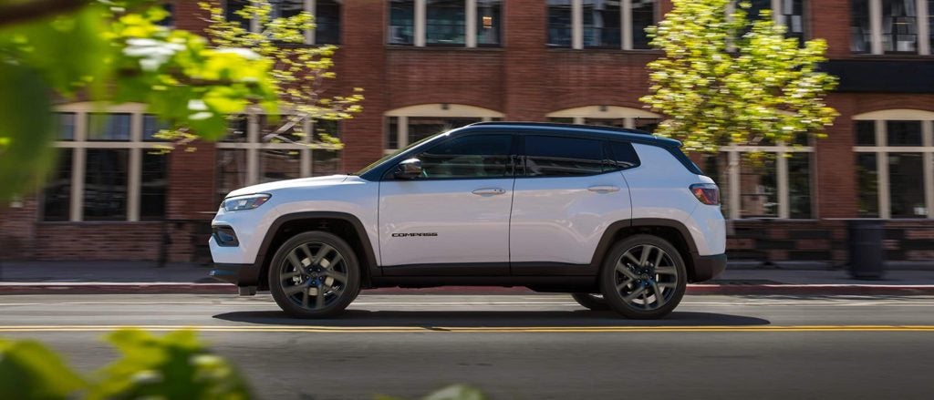 White Jeep Compass on road