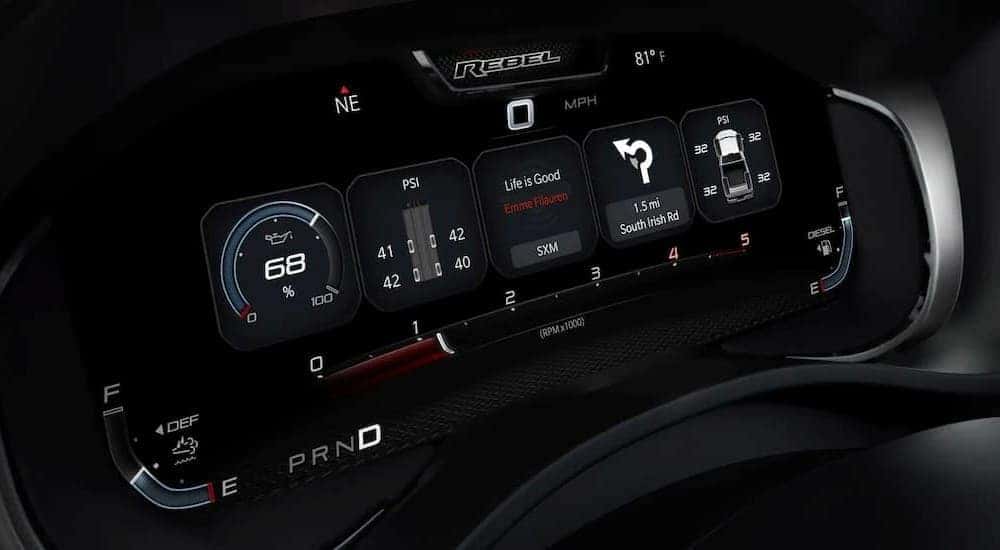 The black digital dash of a 2023 Ram 2500 Rebel is shown.