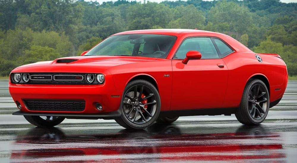 A red 2023 Dodge Challenger RT is shown from the front at an angle.