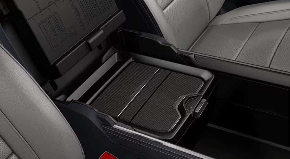 The black reconfigurable center console in a 2024 Ram 1500 is shown.