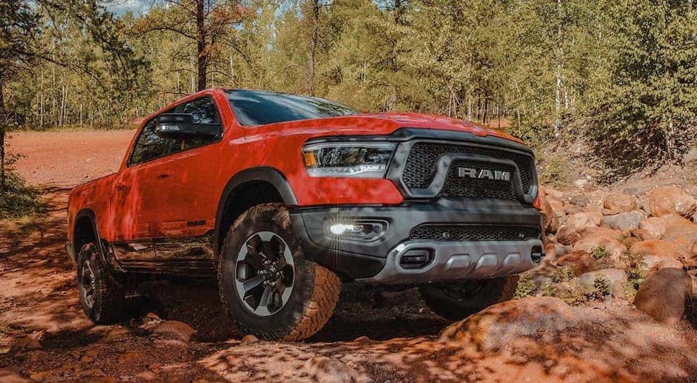 A red 2023 Ram 1500 is shown front he front at an angle.