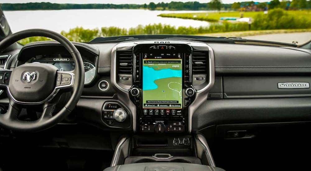 The black interior and dashboard is shown on a 2020 used Ram Laramie 1500.
