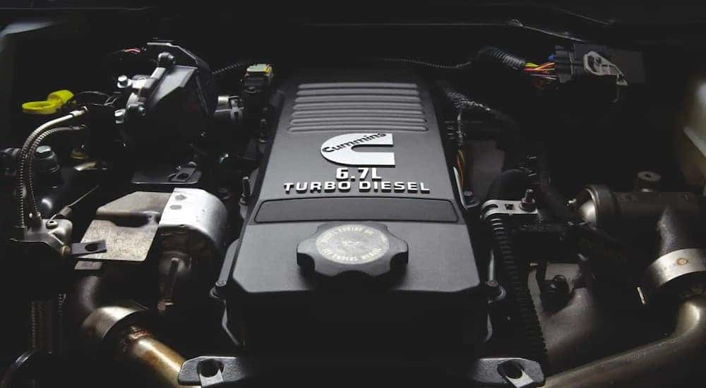 A close up of the Cummins engine is show on a 2021 Ram 3500.
