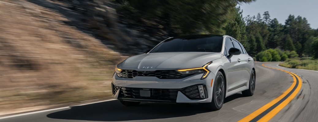 Front view of the 2025 Kia K5 on road
