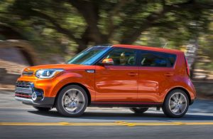 Orange colored Kia Soul.