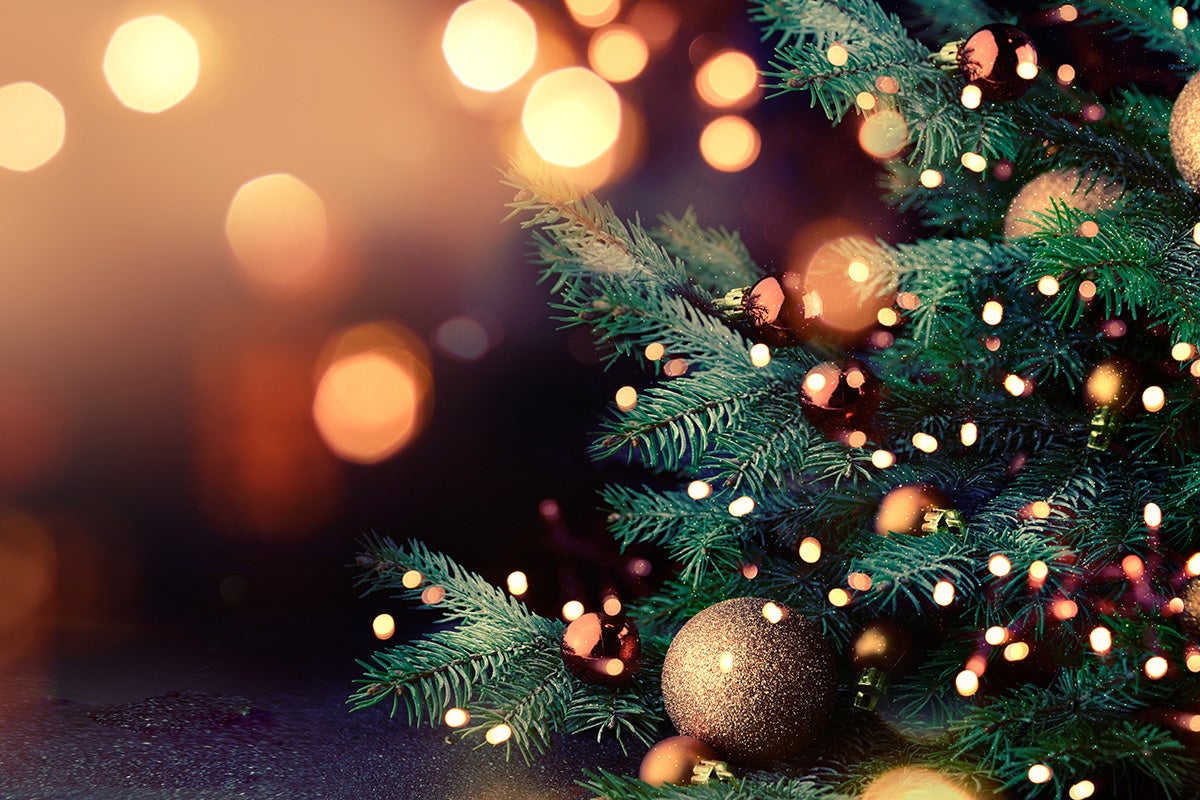 christmas tree with lights and decorations on it