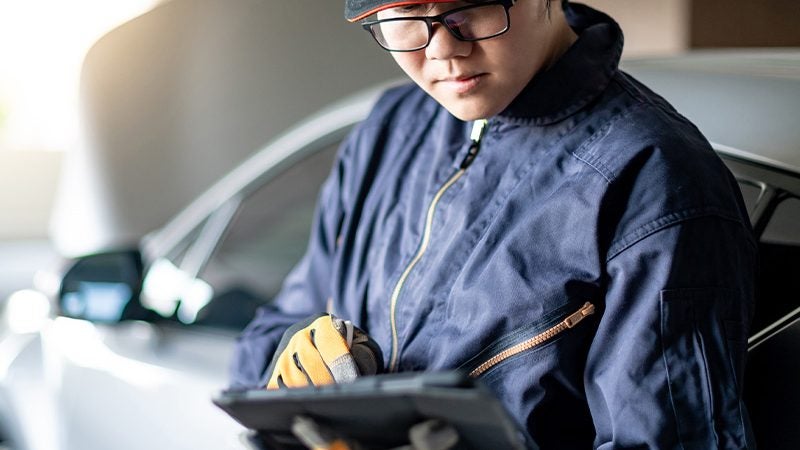 service technician holding an ipad