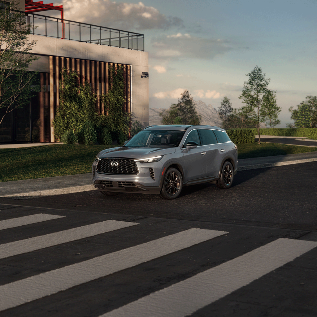 Infiniti QX60 parked in front of a house