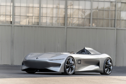 Prototype 10 parked in front of a warehouse