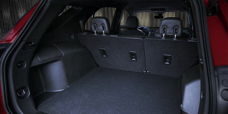 Rear cargo area of the 2022 Chevy Equinox with seats up.