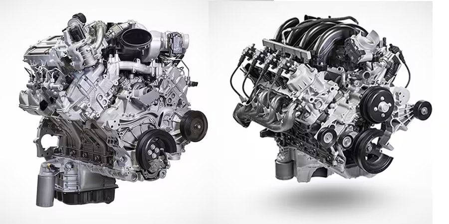 Twin Ford V8 engines, one silver and one grayscale, showcasing modern internal combustion engine design and engineering complexity