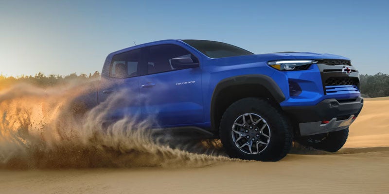 2026 Blue Chevrolet Colorado sowing its off-road capabilities