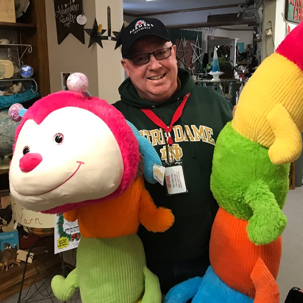 Man With Stuffed Caterpillar