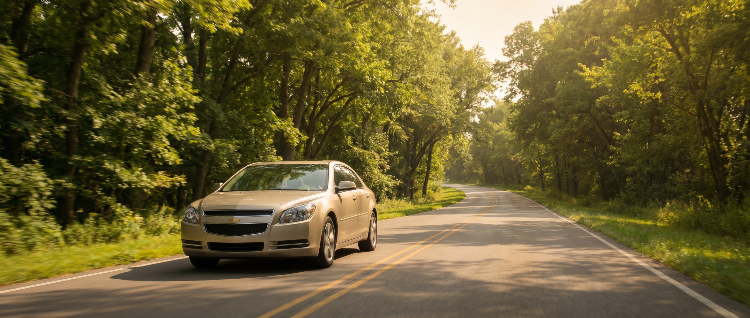 Fuel-efficient Chevrolet driving toward Columbia from Winnsboro, SC on a summer day
