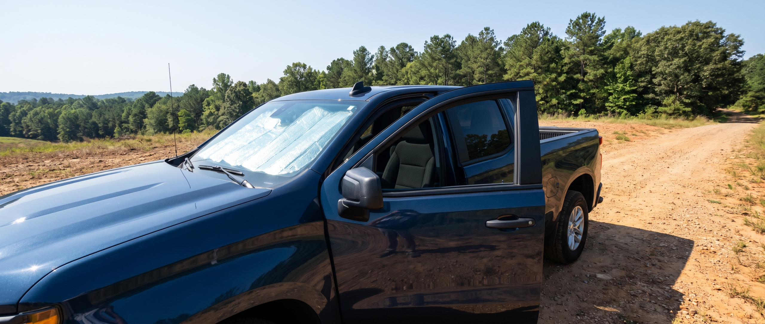 2026 Chevrolet Silverado 1500 with windshield sunshade protecting the interior from South Carolina summer sun