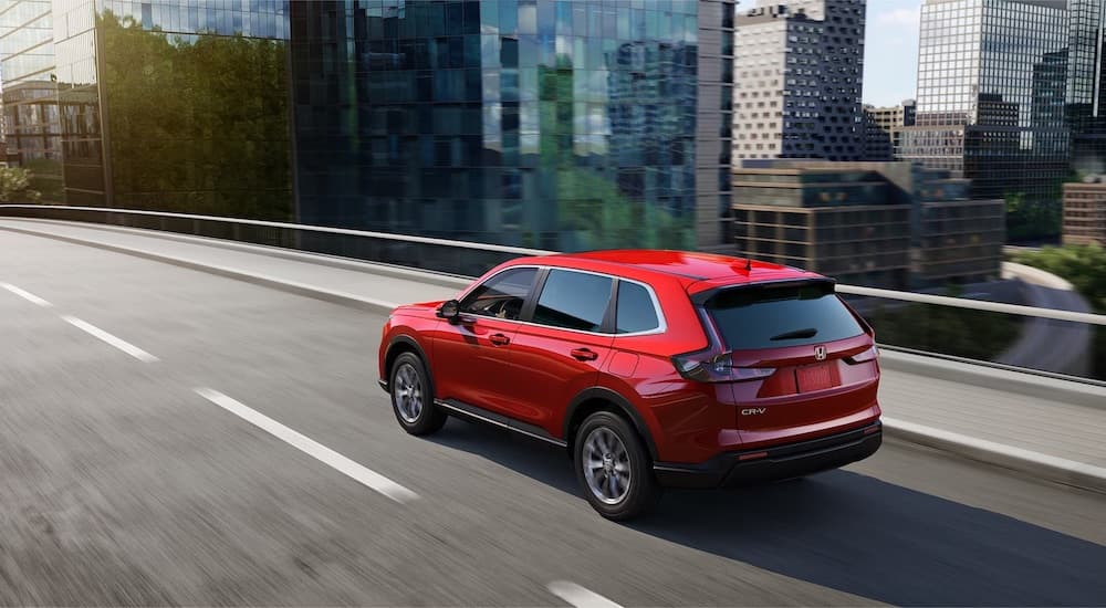 A red 2026 Honda CR-V from the rear.