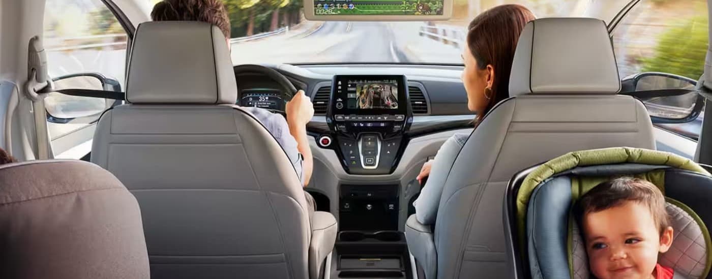 A family driving in a 2025 Honda Odyssey.