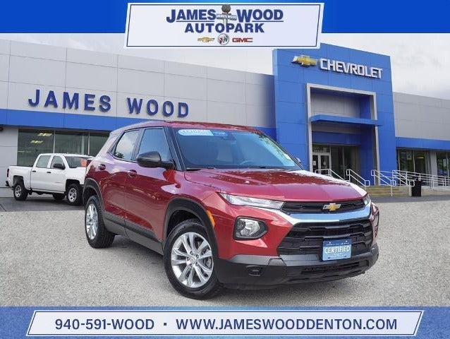 red Chevrolet SUV parked in dealership lot