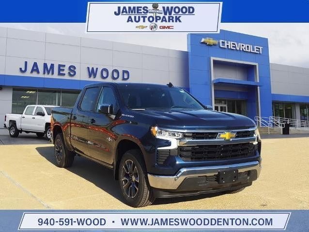 new Chevrolet Silverado truck parked in dealership lot