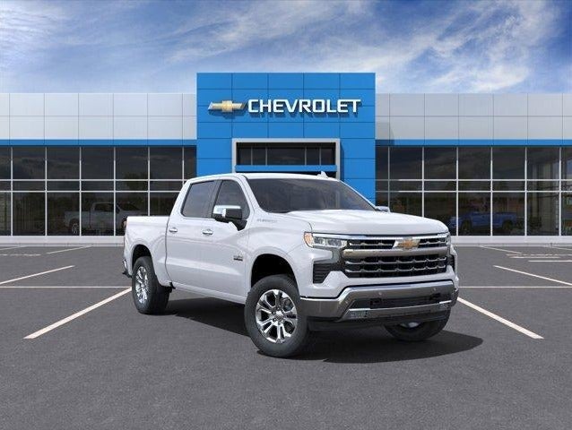 white Chevy Silverado parked in dealership lot