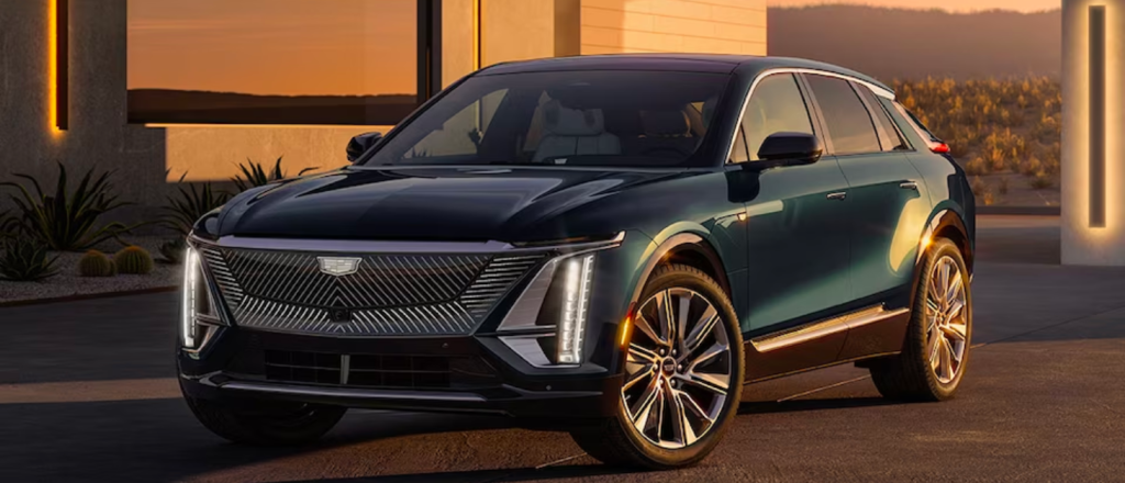 green Cadillac Lyriq parked at sunset