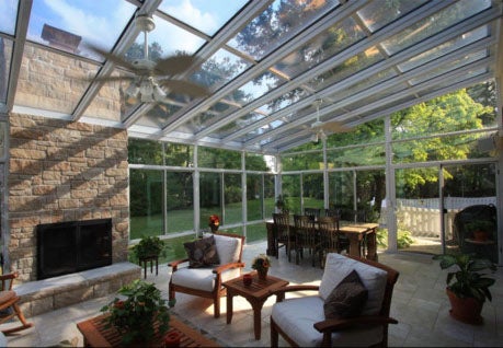exterior enclosed patio with fire place