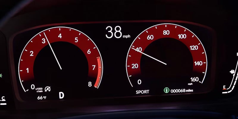 A used Honda Civic instrument panel showing a slew of dashboard lights in San Antonio, TX
