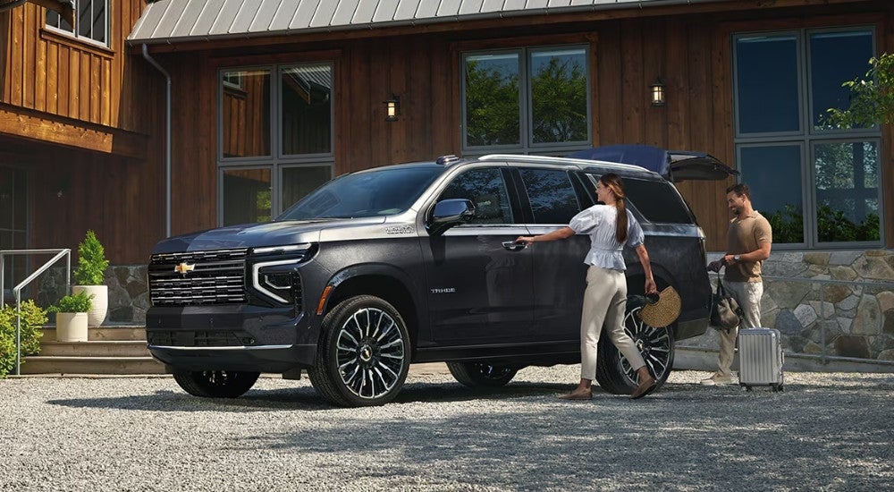 Grey 2025 Chevy Tahoe High Country parked on a driveway