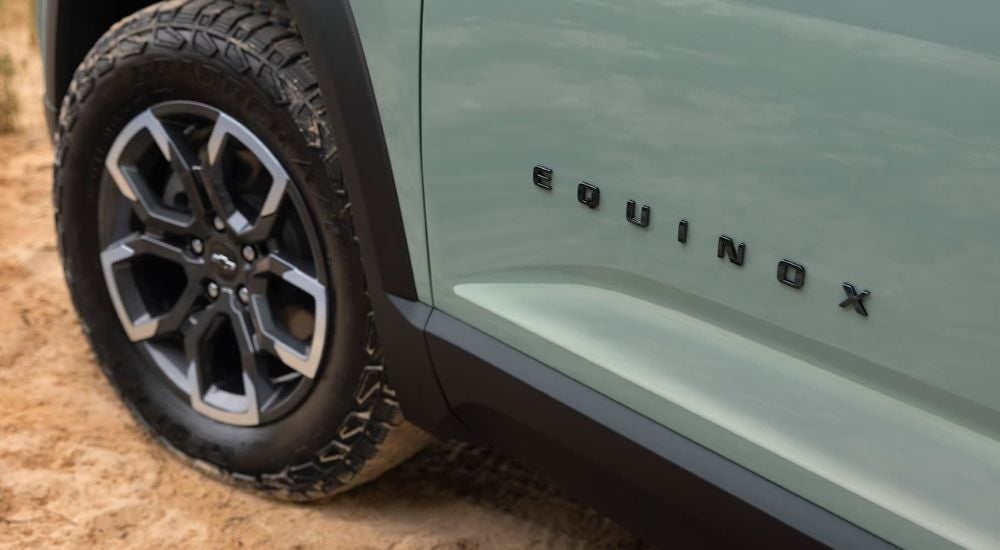 Front driver side wheel on a green 2026 Chevy Equinox ACTIV