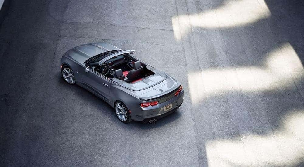A grey 2021 Chevy Camaro is shown after leaving a used Chevrolet dealer.