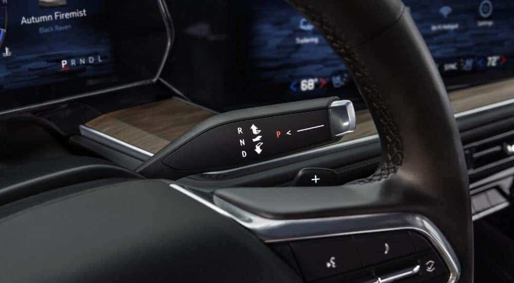 A close up shows a black shifter stalk in a 2025 Chevy Tahoe for sale near Hoover.