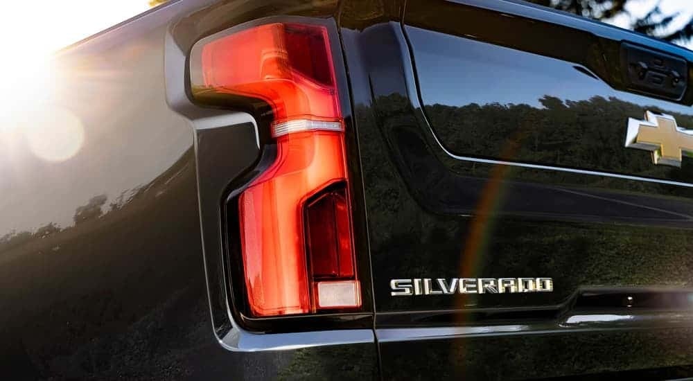 Brake light and tailgate on a black 2026 Chevy Silverado 2500 HD
